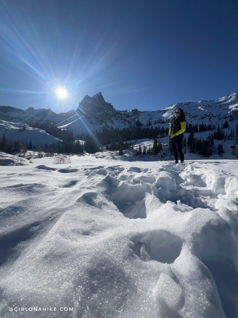 Frozen Lake Blanche in winter surrounded by snow-covered mountains