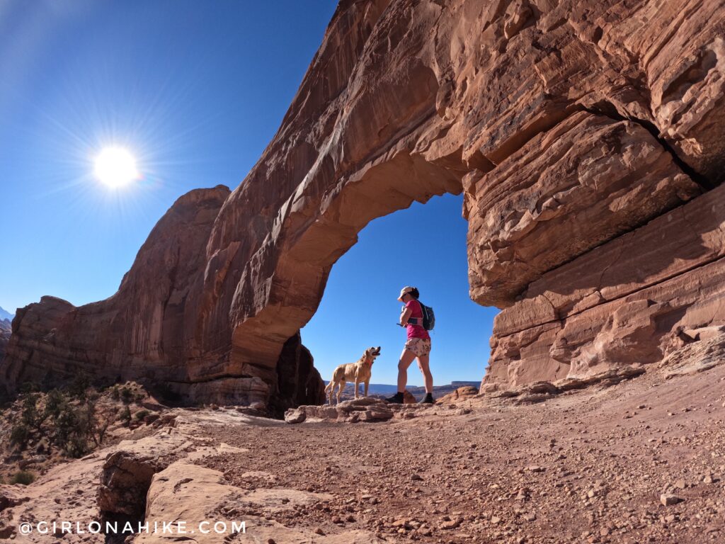 As soon as you pass the barbed wire fence, start keeping an eye out for cairns to guide you. The trail is a mix of slick rock, sandstone, and sand.