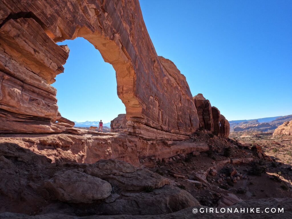 As soon as you pass the barbed wire fence, start keeping an eye out for cairns to guide you. The trail is a mix of slick rock, sandstone, and sand.